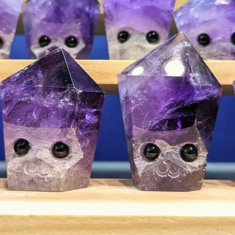 Crystal Buddy holding a crystal