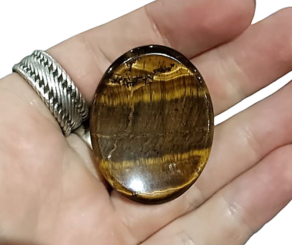 Oval Crystal Palmstone · Tigers eye